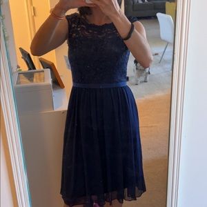 Navy bridesmaid dress with empire waist and lace bodice. Size 0. Worn once.